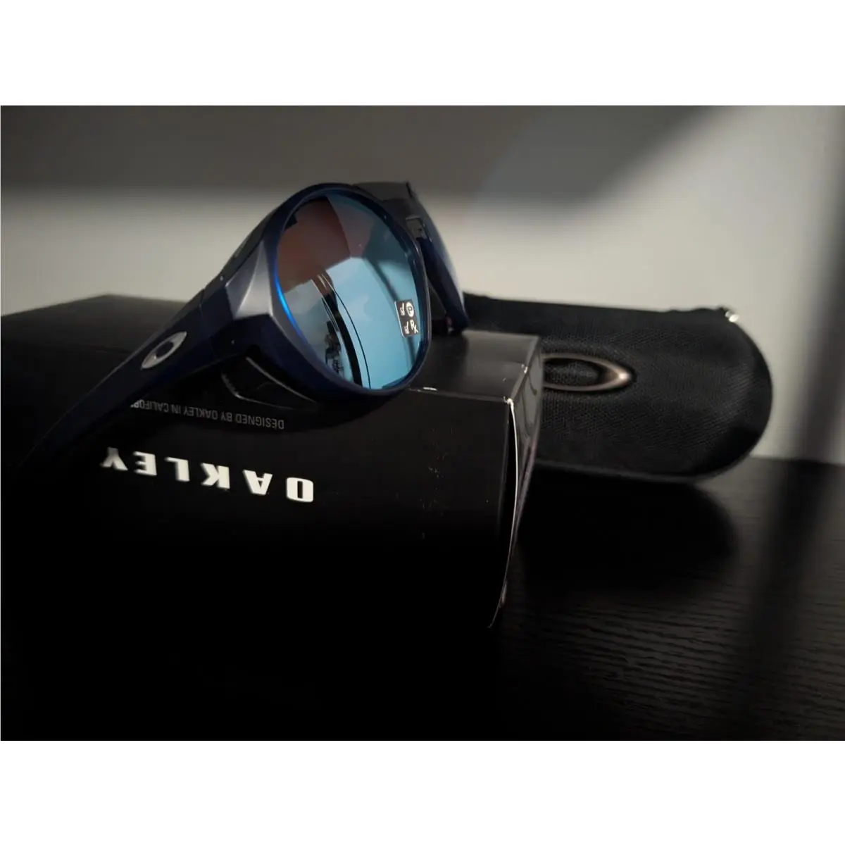 Clifden Mt Translucent Blue Polarized Prizm Deep Water Sunglass 9440-05 by Oakley