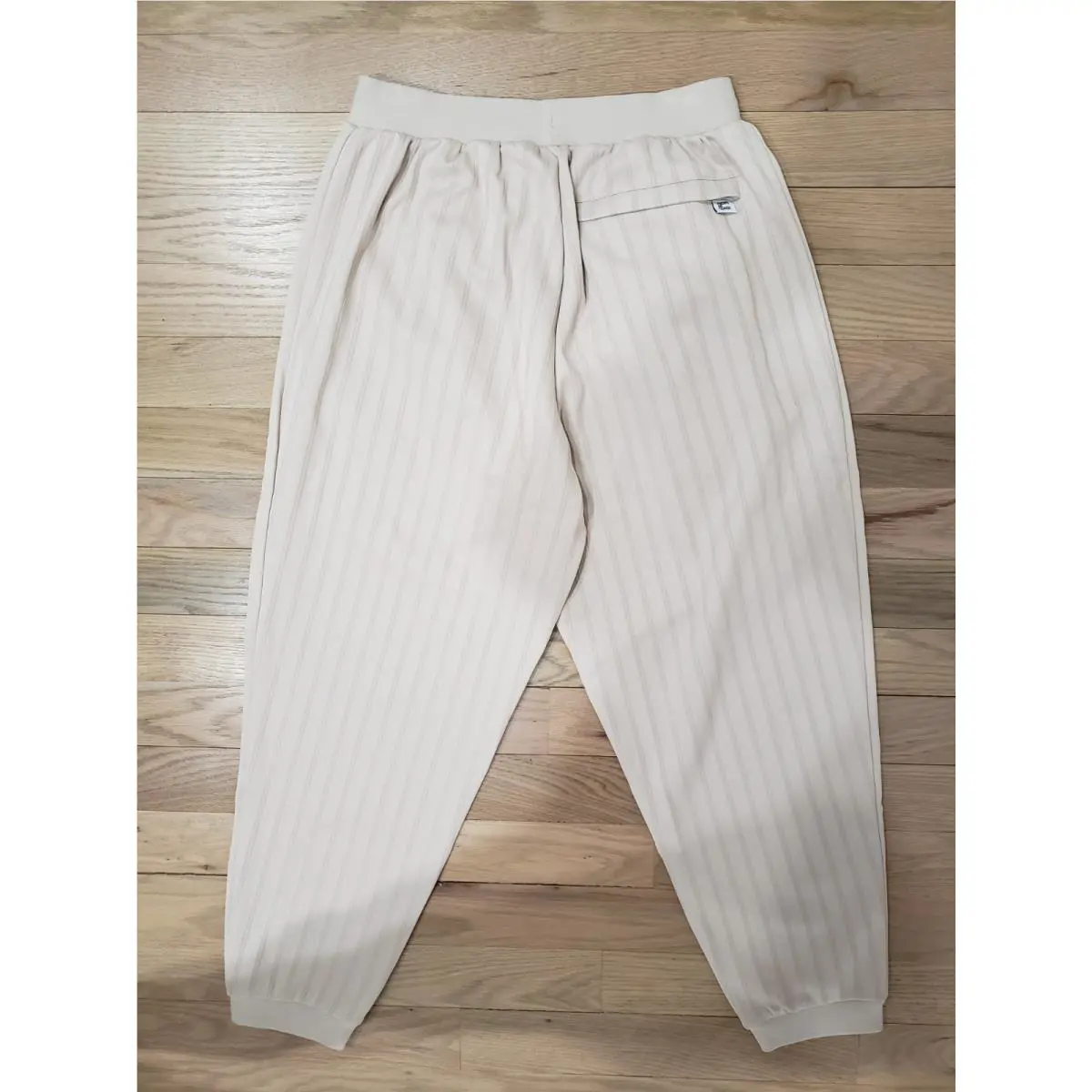 Puma clothing - Beige (UPC: 197671394801) 1