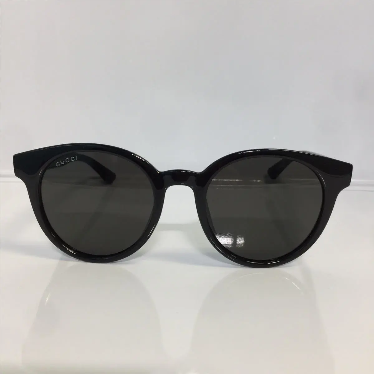 Gucci GG0638SK 002 Black Round Plastic Woman Sunglasses