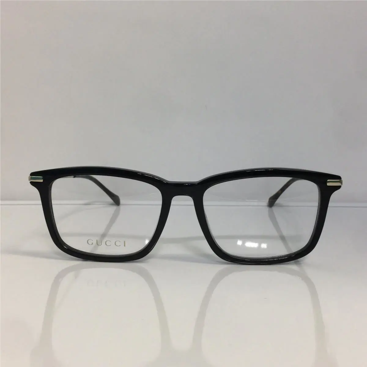 Gucci GG0920O 004 Black Plastic Gold Temples Men’s Plastic Eyeglasses 54mm