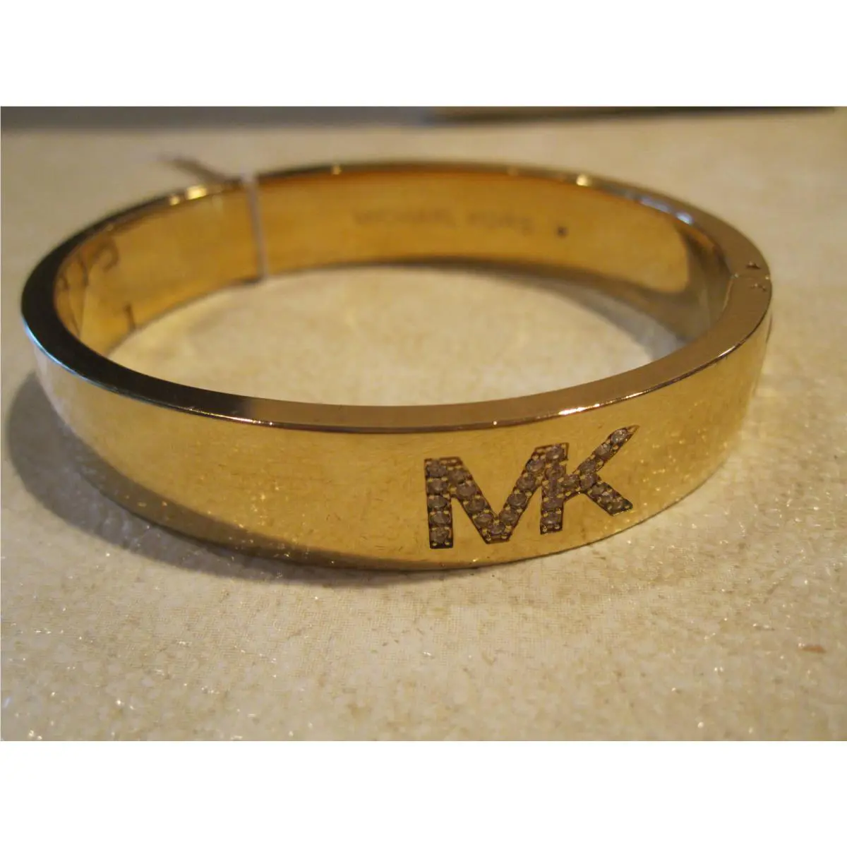 Michael Kors Fulton Logo Bangle Bracelet- Gold Tone w/ Pave Stones-$125