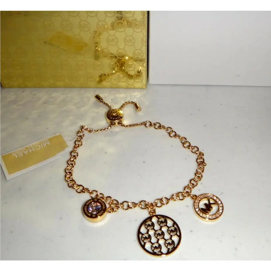 Michael Kors 3-PC MK Logo Charms Gold Slider Bracelet Crystals MKJ7386710 + Box