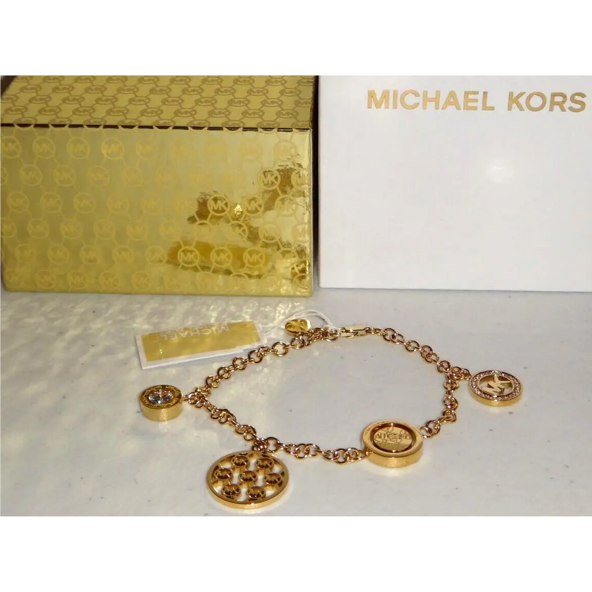 Michael Kors 4-PC MK Logo Charms Gold Slider Bracelet Crystals MKJ7383710 + Box