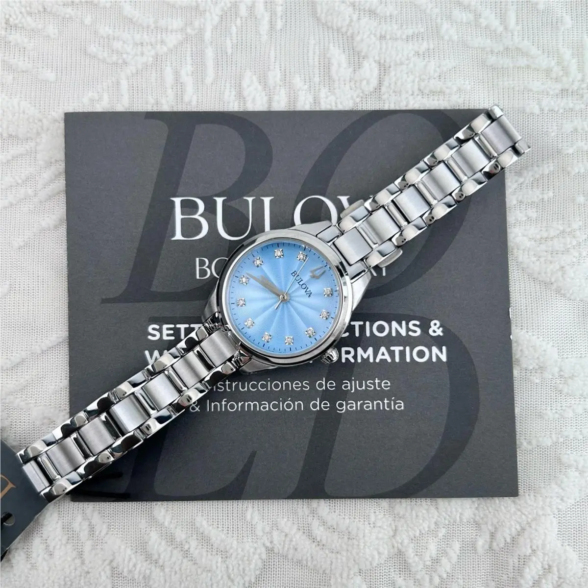 Bulova Classic Sutton Diamond Blue Dial 96P250 Women`s Quartz Watch 28MM - Dial: Blue, Band: Silver, Bezel: Silver