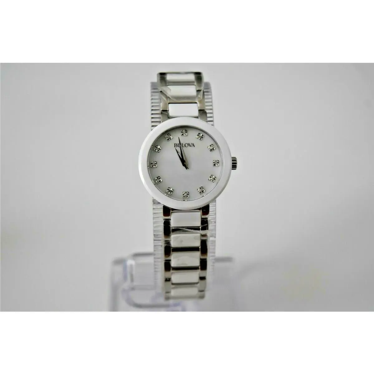 Rotary Bulova Women`s White Ceramic SS Diamond 98P158 Watch