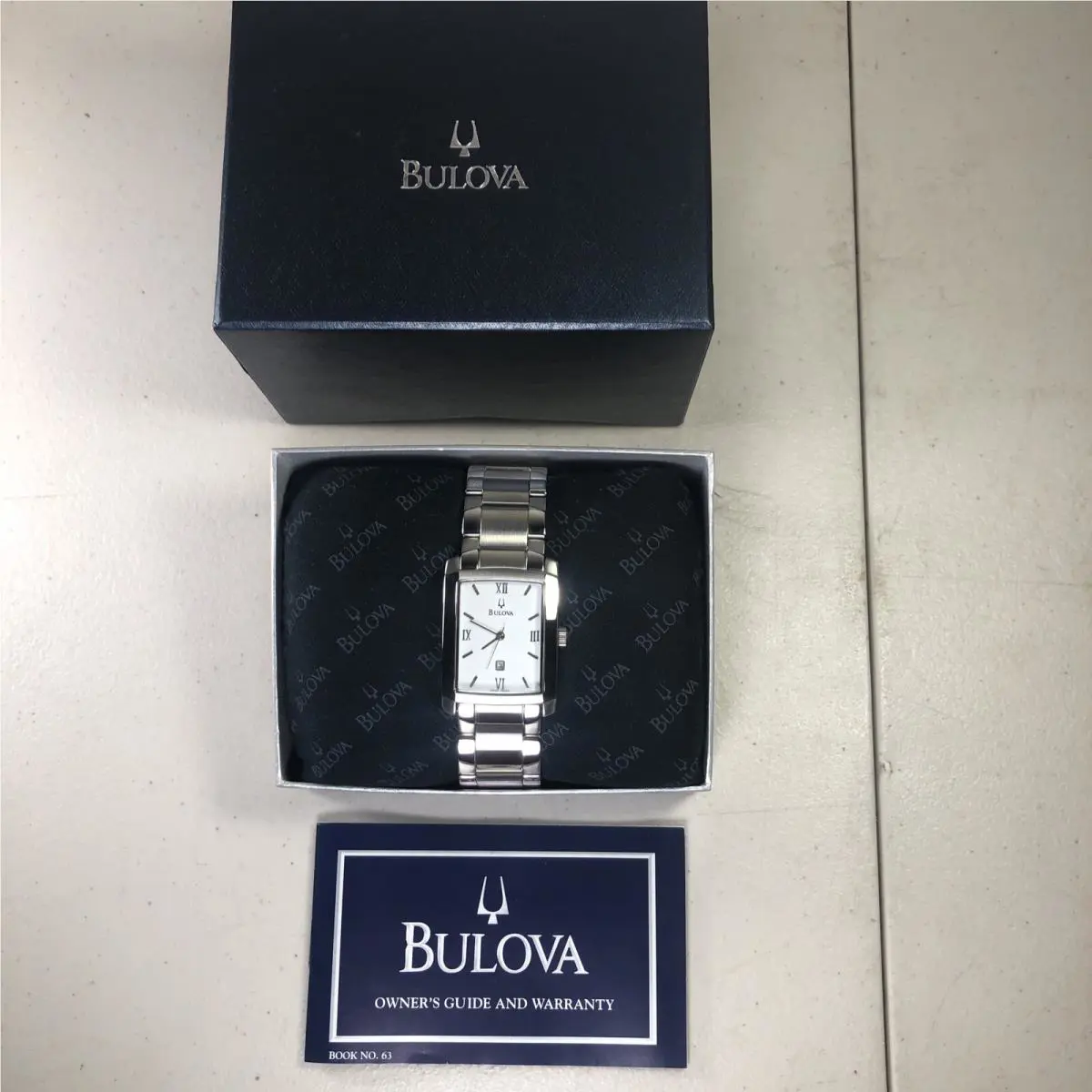 Bulova 96G25 Mens Stainless Steel White Dial Quartz Date Watch Battery