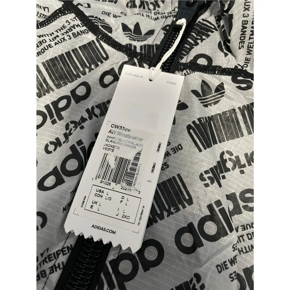 Adidas clothing - AW Windbreaker - Windbreaker - CW3389 - White (UPC: 191028222113) 0