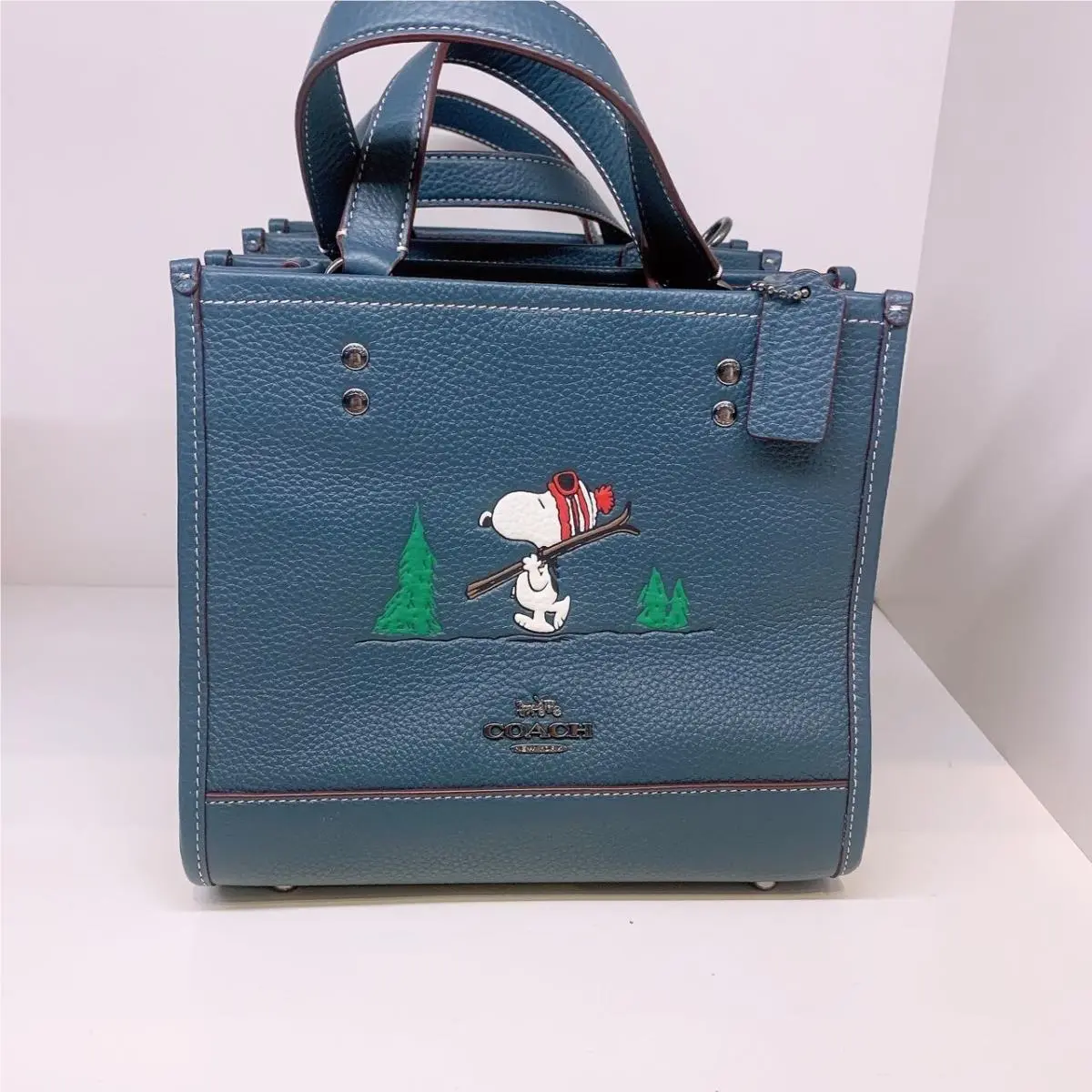Coach X Peanuts Dempsey Tote 22 with Snoopy Ski Motif CE849