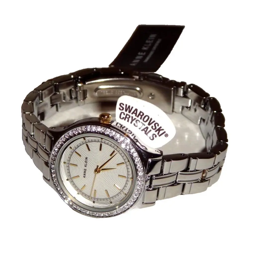 Anne Klein Women`s Silver Watch Silver Dial 30mm Swarovski Crystals AK/2451SVTT