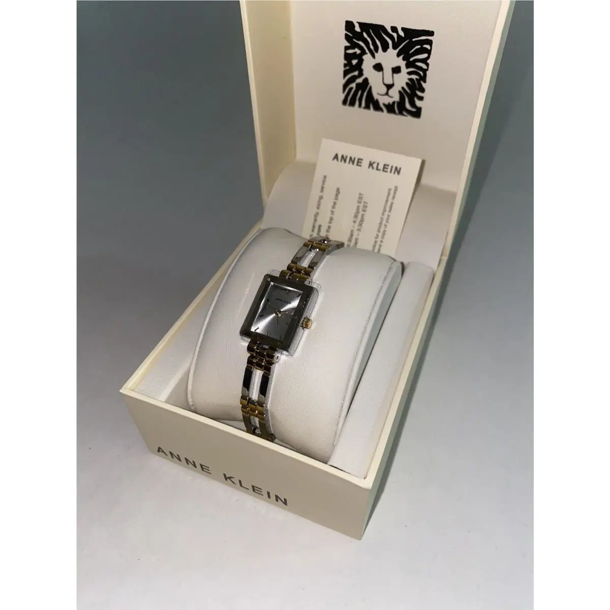 B1A Anne Klein 10-4899SVTT Wrist Watch For Women Silver Gold Stanless Steel