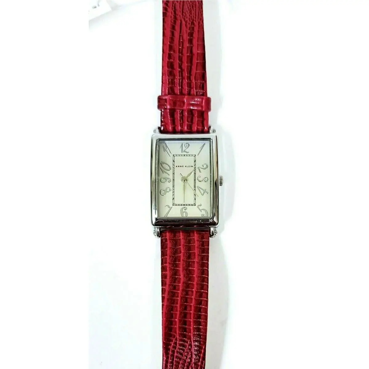 Anne Klein Silver Tone Fuchsia Embossed Leather Backing Band Watch AK/2175
