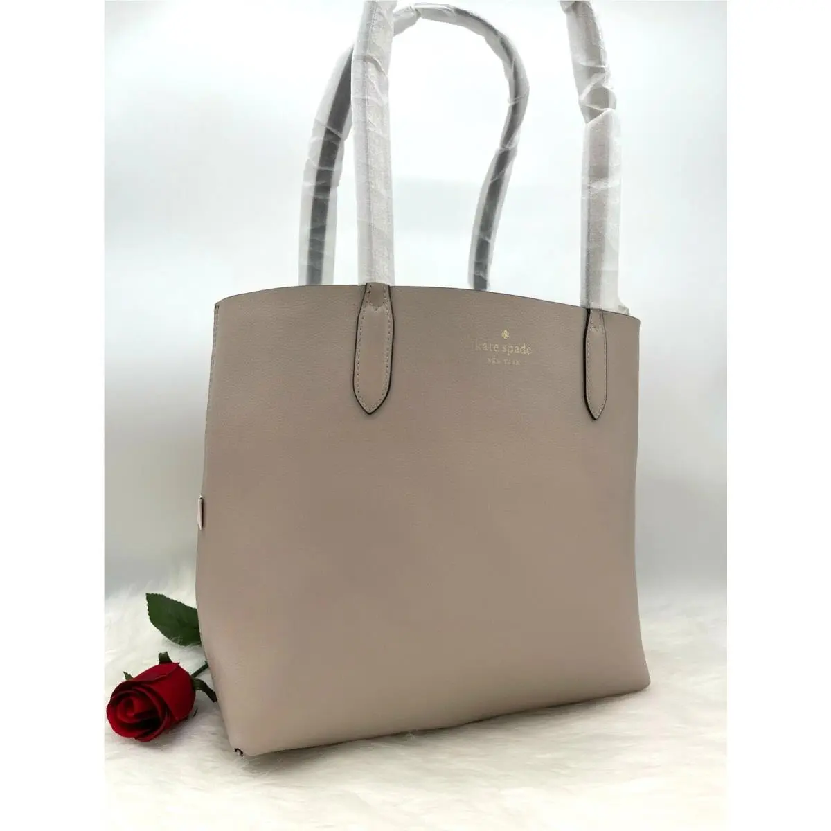 Kate Spade New York Ava Reversible Coin Pouch Tote In Black/ Beige