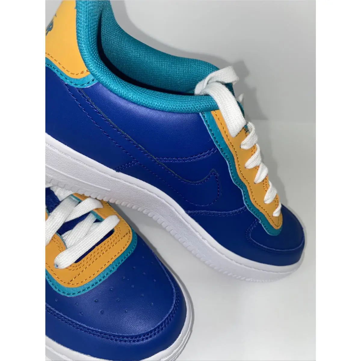 Nike shoes - Indigo/Gold/Teal (UPC: 00192499850423) 2