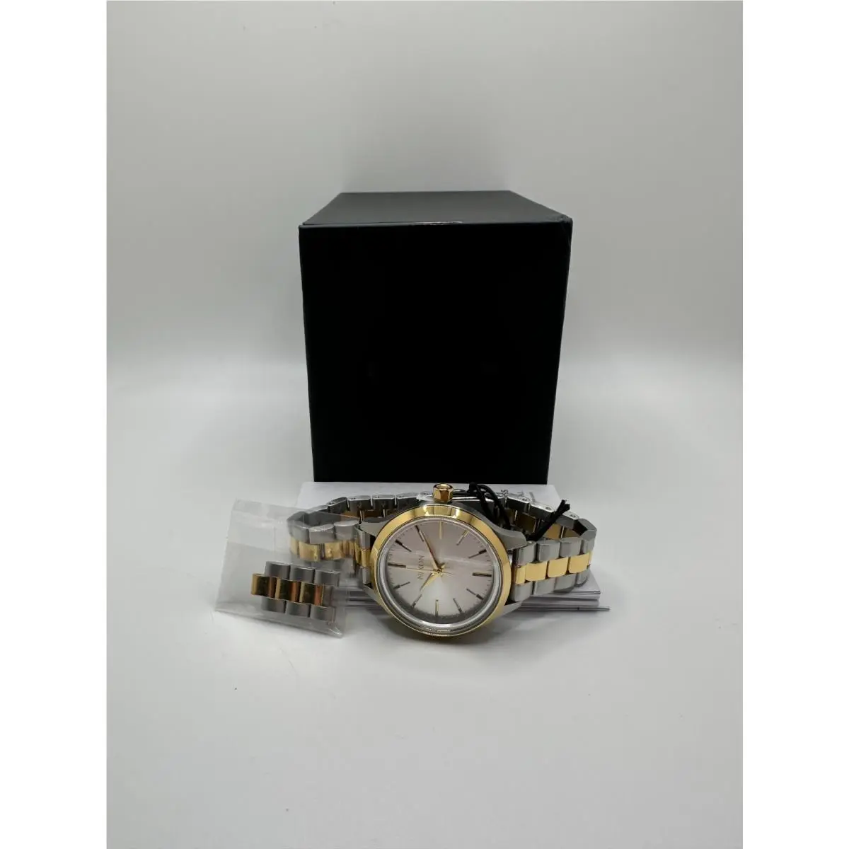 Optimist Womens Silver Case White Dial Quartz Wristwatch A1342-1921-00 by Nixon