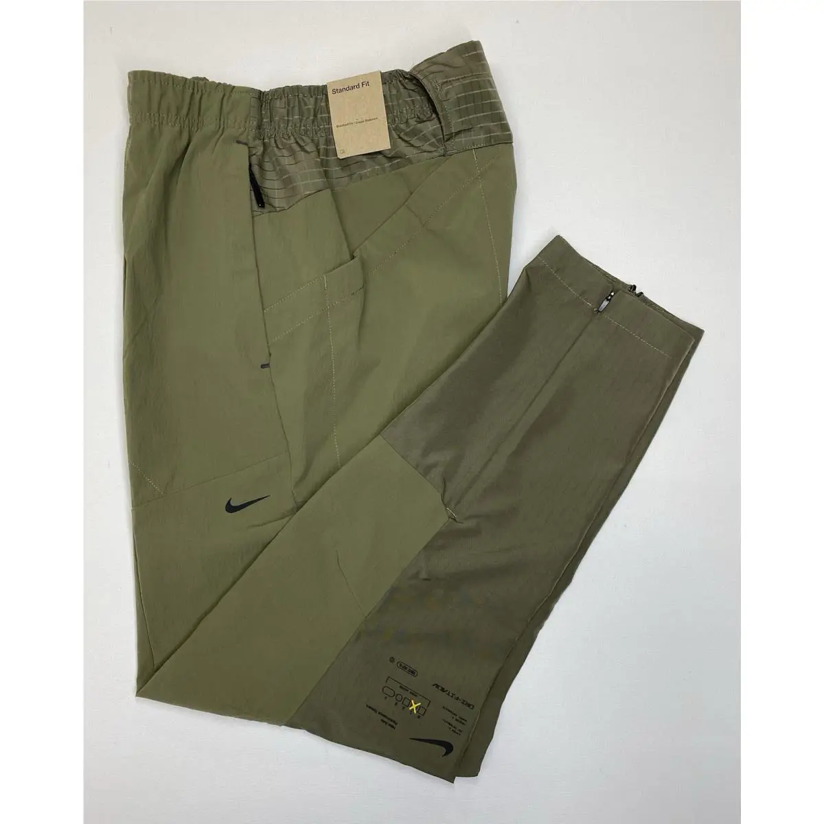 Nike clothing - Nike APS Men`s Dri-FIT ADV Woven Versatile Trousers - FB6851-222 - Green 13