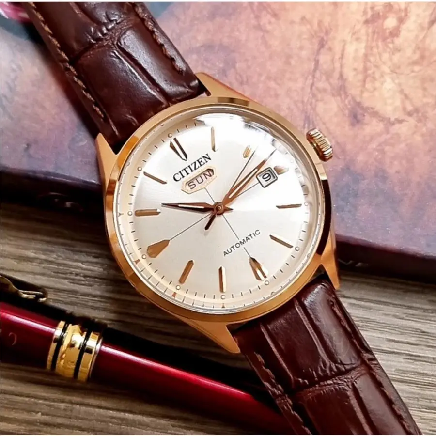 NH8393-05A Automatic Rose Gold Tone White Dial Day Date Men`s Watch by Citizen