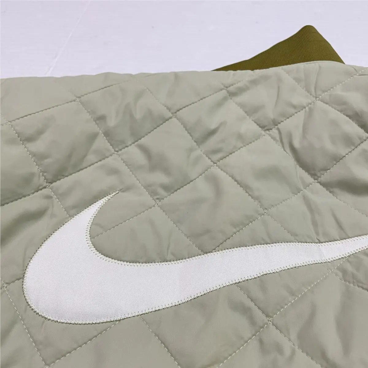 Nike clothing - Nike Air Sportswear Reversible Varsity Bomber Jacket - DV7876 307 - Olive Green (UPC: 196974909644) 12