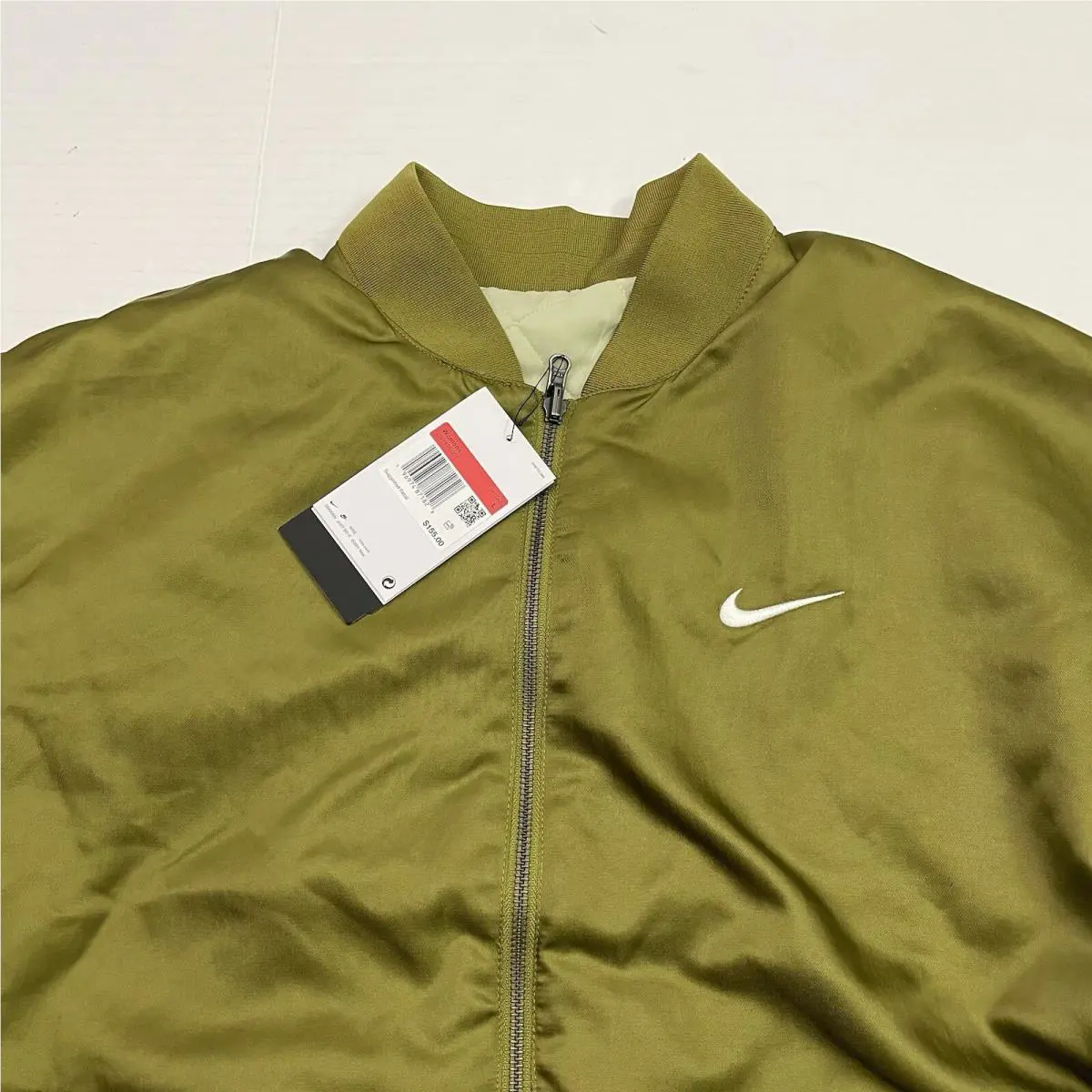 Nike clothing - Nike Air Sportswear Reversible Varsity Bomber Jacket - DV7876 307 - Olive Green (UPC: 196974909644) 0