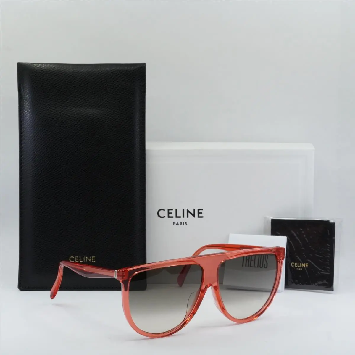 CL40006I 66F Transparent Red/gradient Brown 62-13-145 Sunglasses by Celine