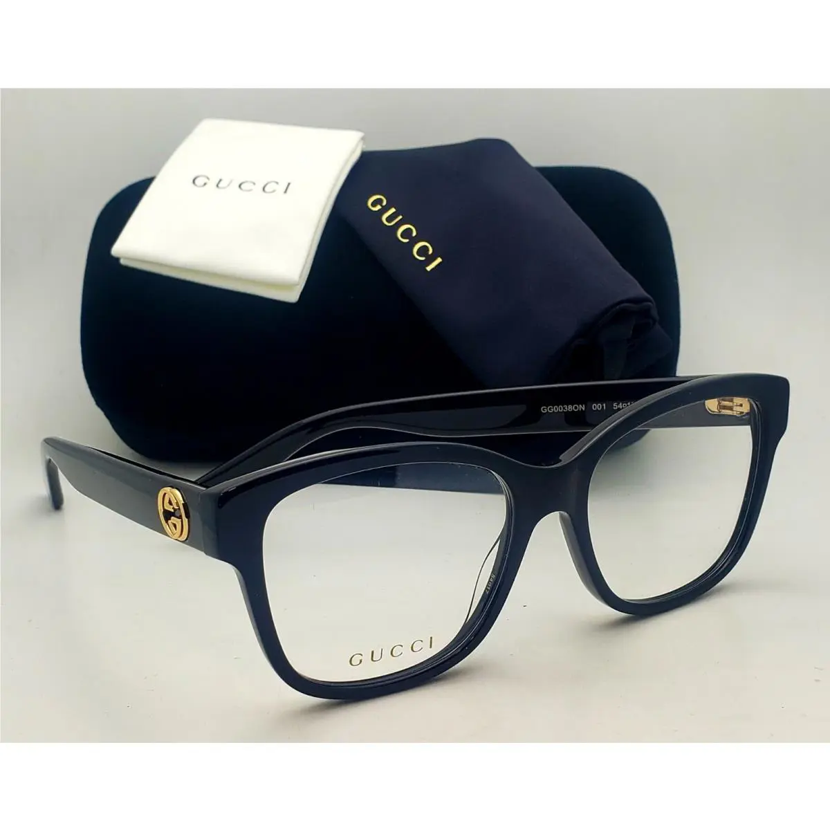 Gucci Eyeglasses GG0038O 001 54-17 140 Shiny Black Gold Rectangular Frames