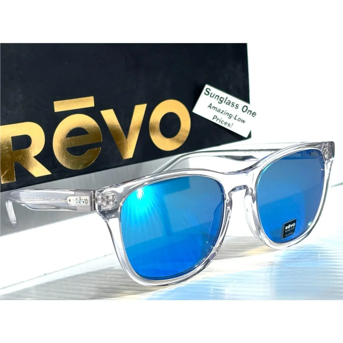 Tatum Shiny Crystal Clear Polarized Blue Glass Sunglass 1254 09 H2O by Revo