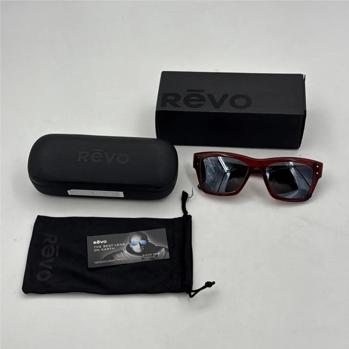 Sunglasses Women`s RE1241 06 GY Indigo Burgundy Graphite by Revo