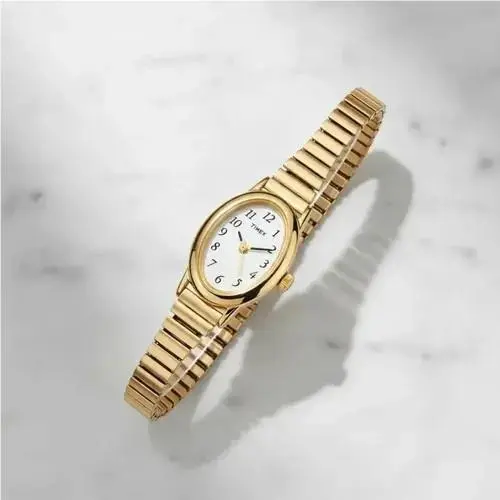 Cavatina Women`s White Dial Oval Gold Expansion Bracelet Watch T21872 by Timex