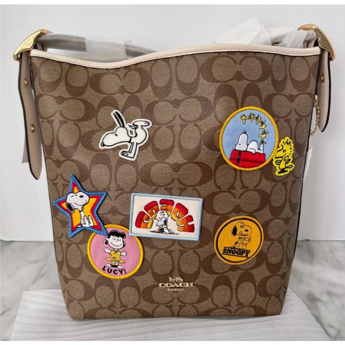 Coach X Peanuts Val Duffle Bag In Signature Canvas with Patches