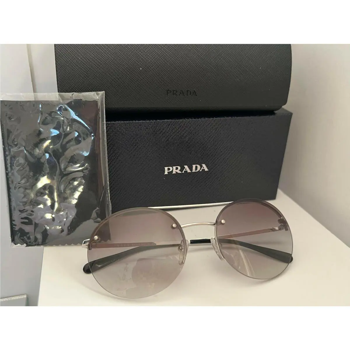 Prada SPS54R Round Gray Sunglasses 56MM 250