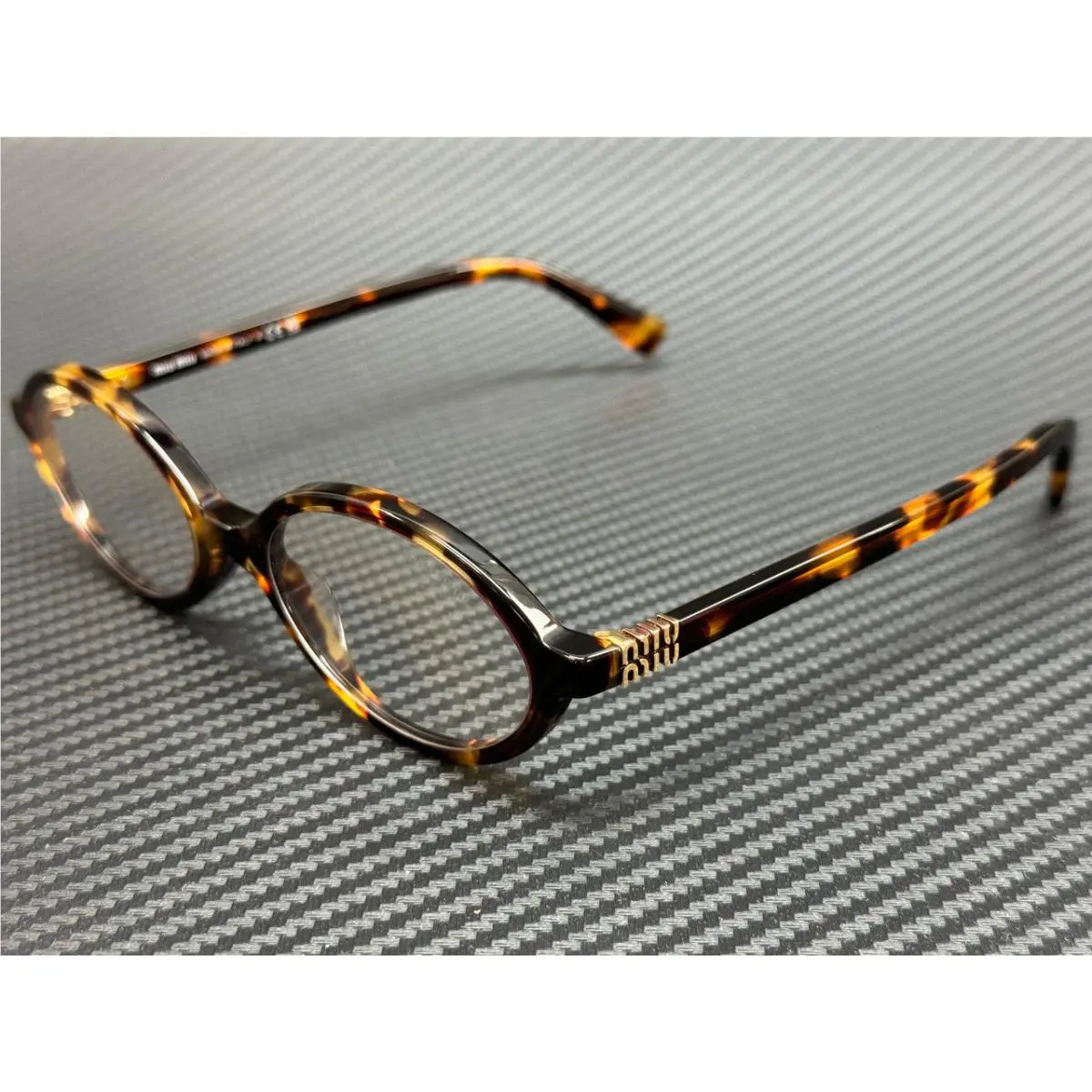 Miu Miu MU 04ZS VAU08N Honey Havana Blue Light Filter Women`s 50 mm Sunglasses