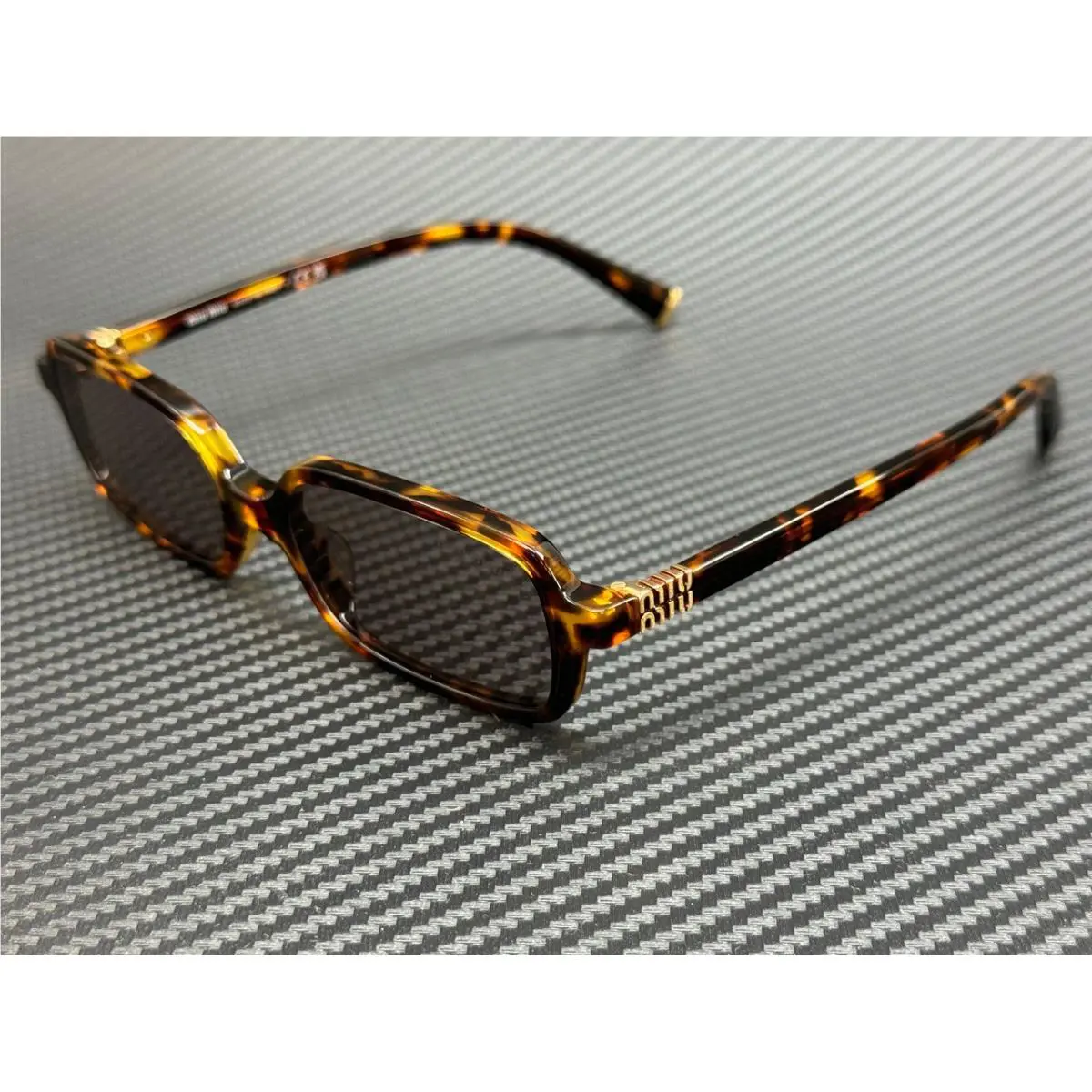 Miu Miu MU 11ZSF 14L20I Havana Honey Purple Women`s 52 mm Sunglasses