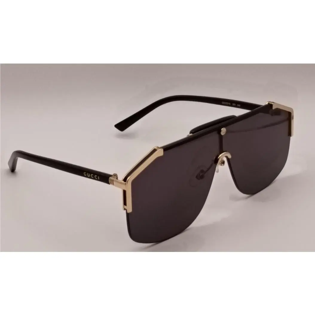 Gucci GG0291S Men Sunglasses Oversized Shield Black Gold Metal Frame Gray Lenses