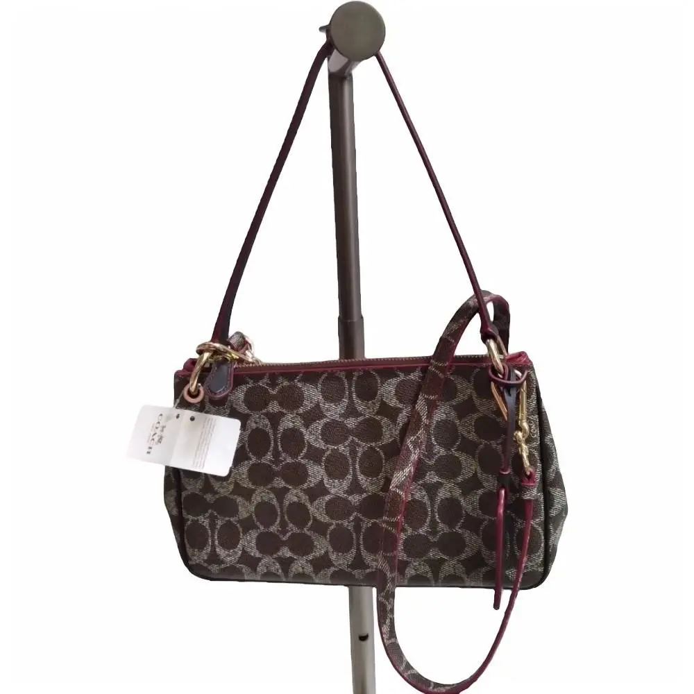 Coach Charley Crossbody in Signature Canvas 34546 Brown/light Gold/ Purple - Hardware: Gold, Exterior: Brown, Lining: Red