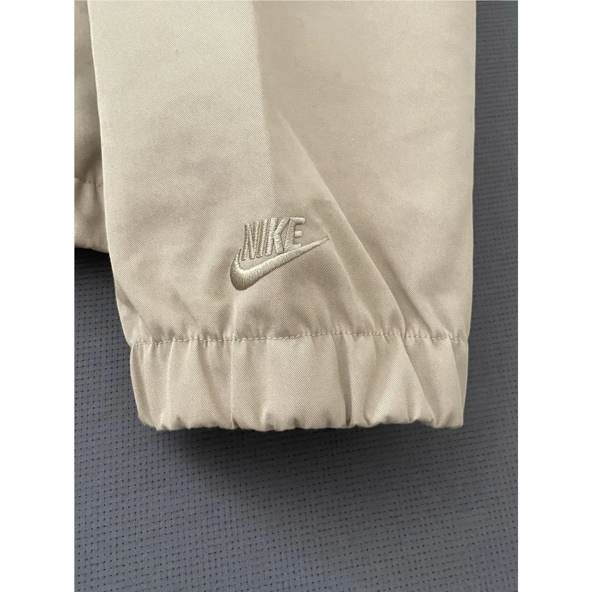Nike clothing - Nike NSW Tech-Pack STORM-FIT Khaki Jacket - FN2608-247 - Beige (UPC: 0196976196523) 1