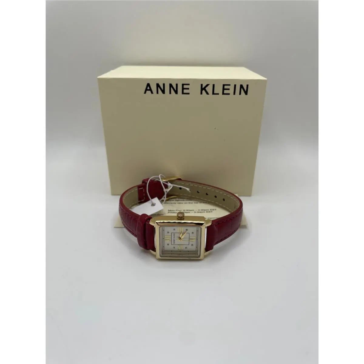 Anne Klein AK/5002 Womens Gold Case Red Band Analog Square Wristwatch