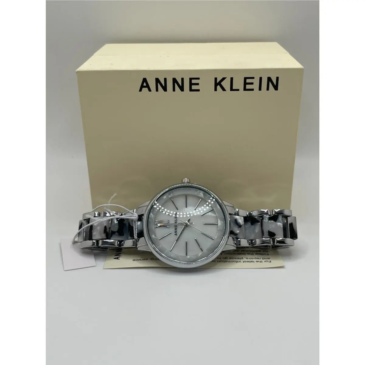 Anne Klein Womens Silver Round Roman Numerals Analog Display Wristwatch