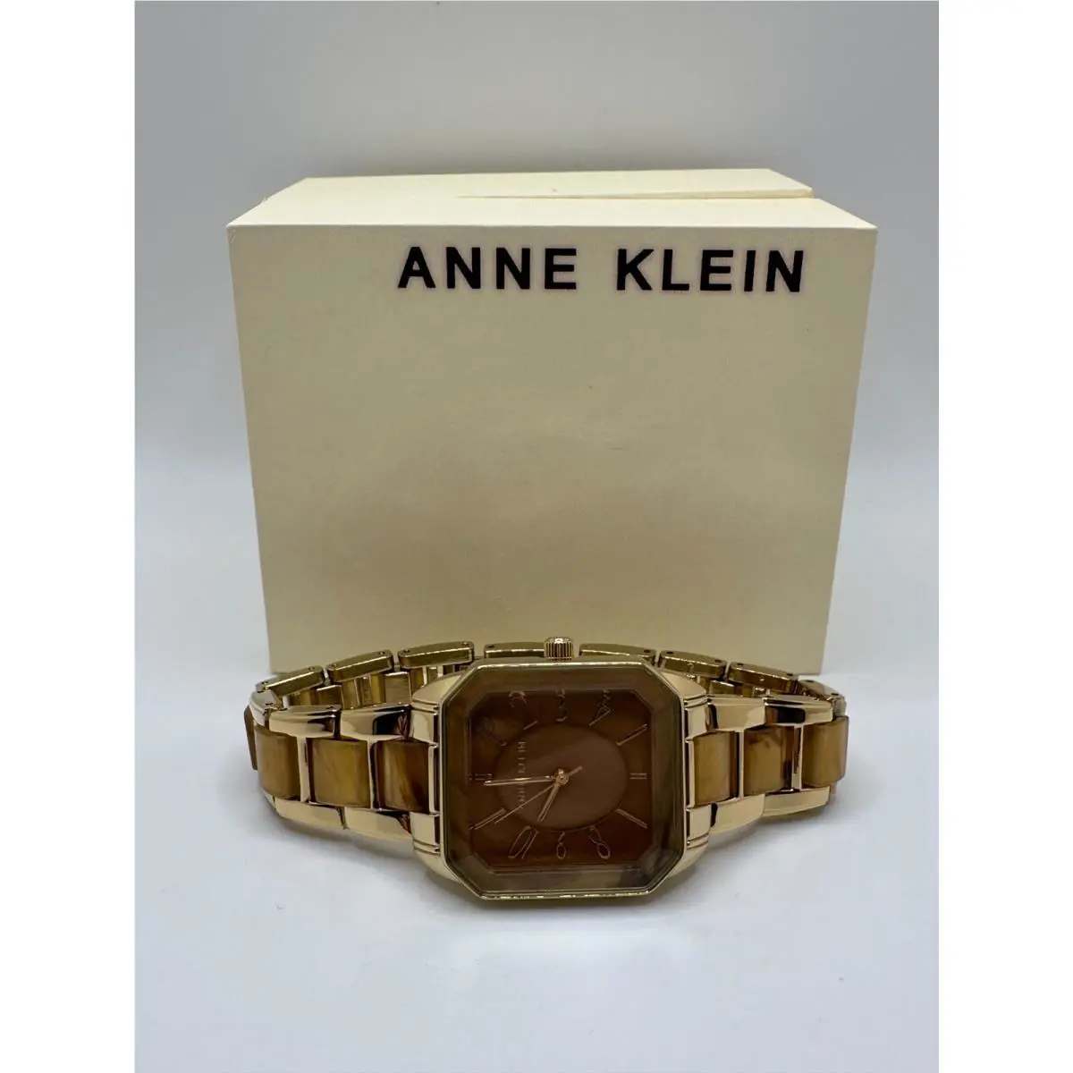 Anne Klein AK/3972 Womens Brown Dial Gold Band Analog Octagonal Wristwatch