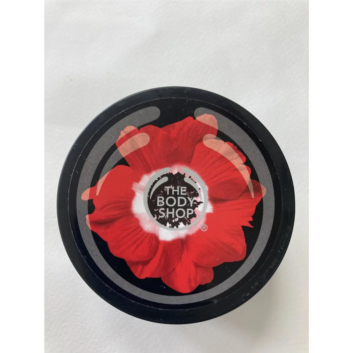 The Body Shopsmoky Poppy Poppy Seed Scrub- 7.9 Oz -new by THE BODY SHOP