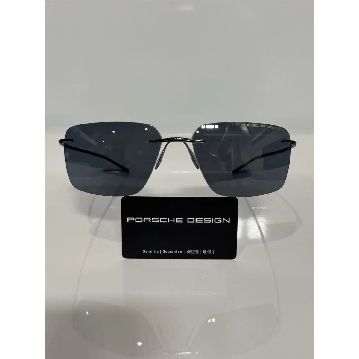 Porsche Design P8923 C Gunmetal Titanium Rimless Grey Sunglasses 62mm