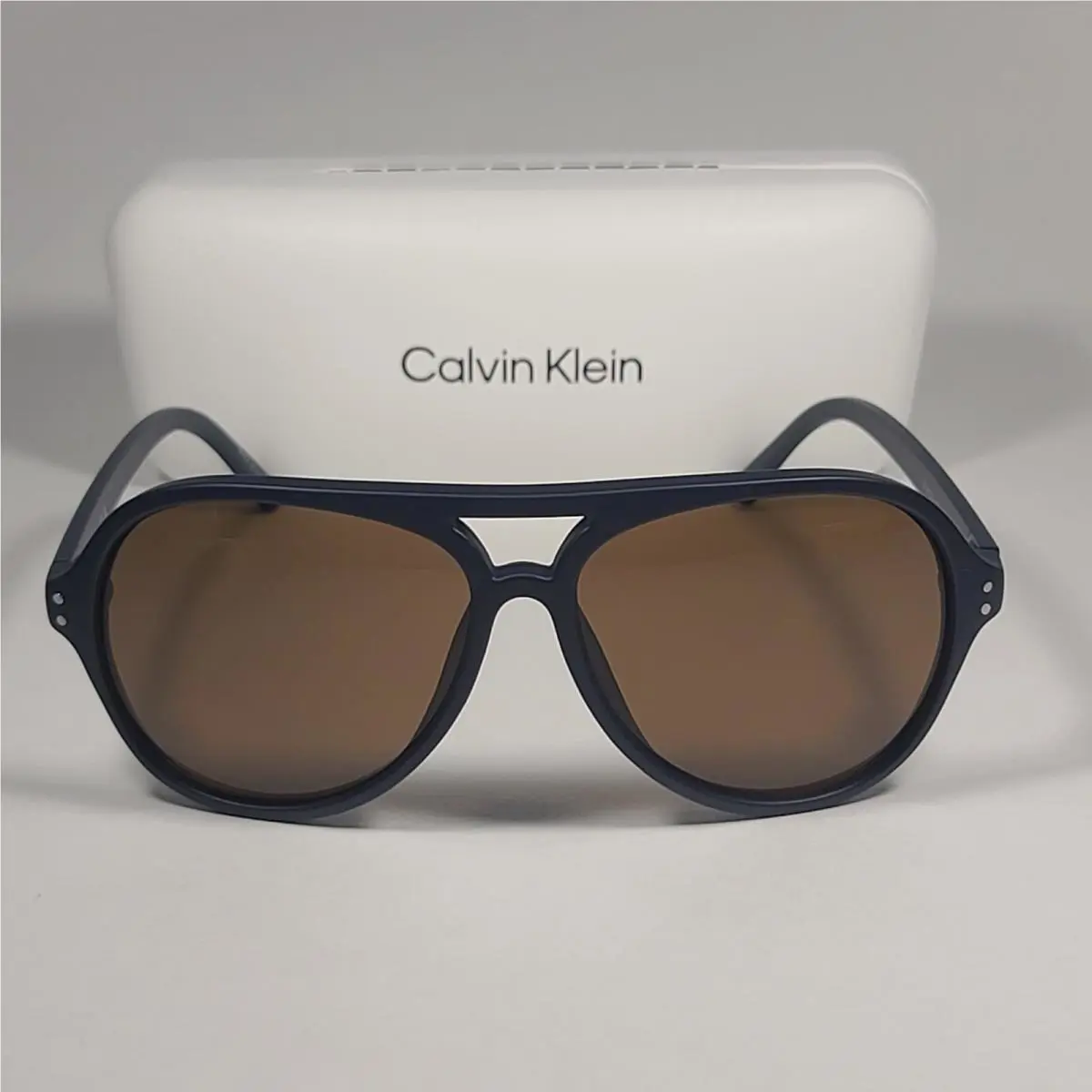 Calvin Klein CK19532S 410 Turbo Aviator Sunglasses Navy Blue Frame Brown Lens