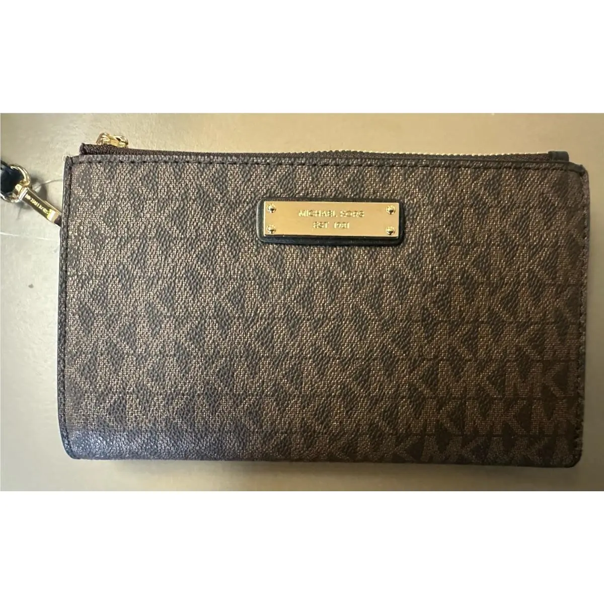 Jet Set East West Phone Wristlet Brown Signature Gold Plate by Michael Kors