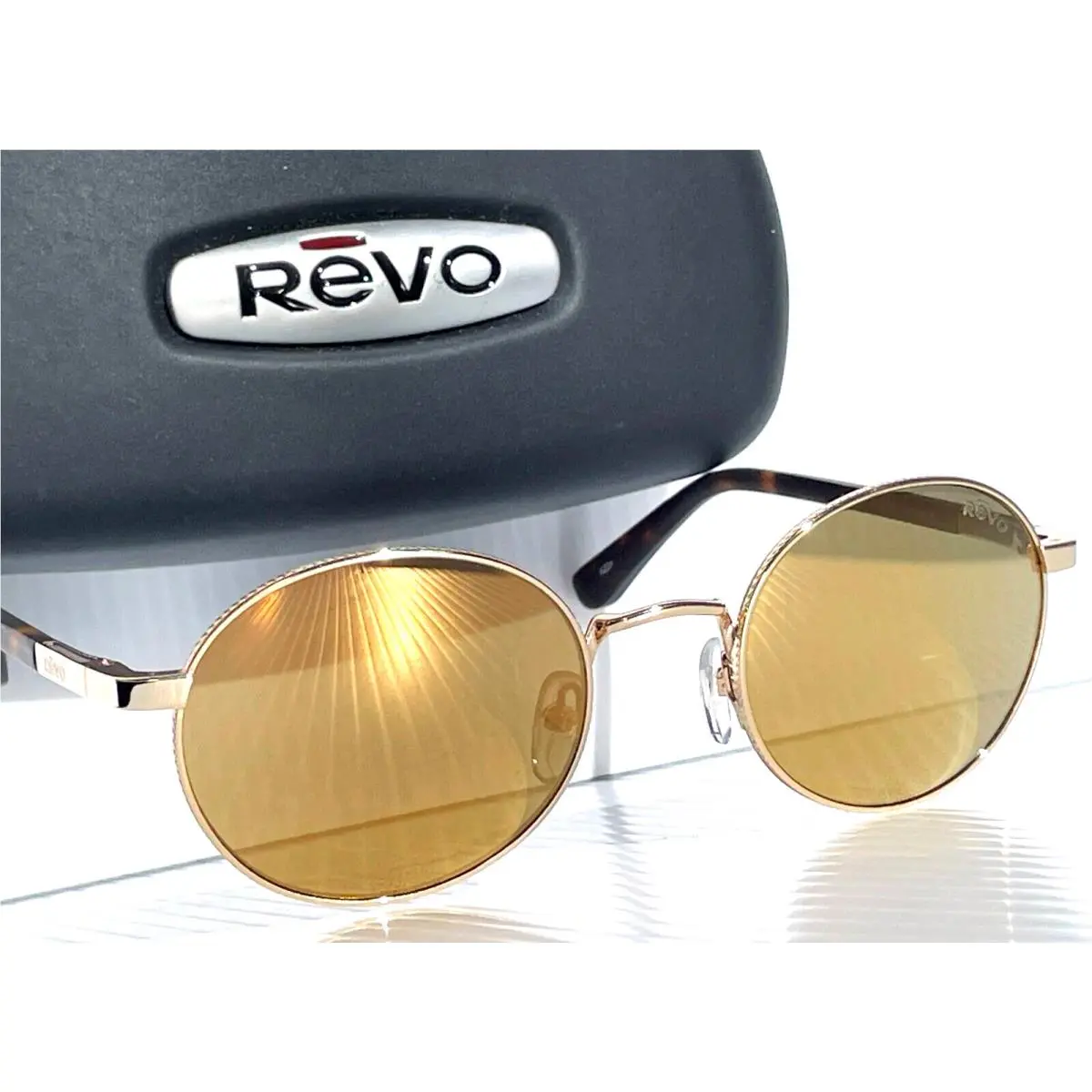Revo Riley Shiny Gold Polarized Champagne Lens Sunglass RE 1143 04 CH