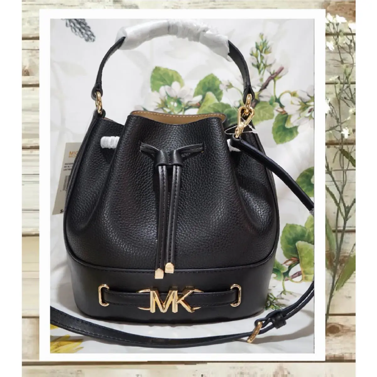 Michael Kors Reed Women Medium Pebbled Leather Crossbody Bucket Bag Luggage