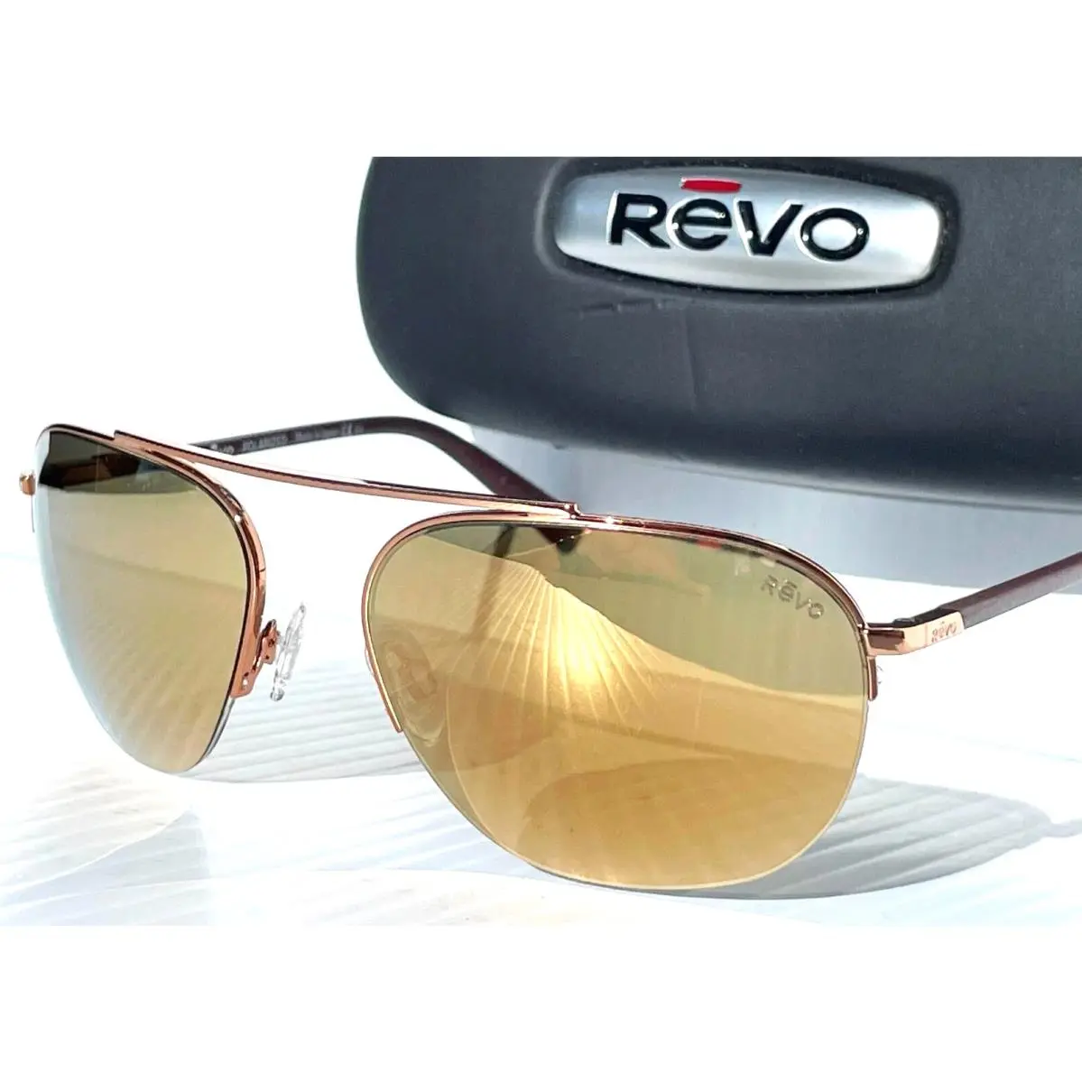 Revo Annika Shiny Rose Gold Polarized Gold Lens Sunglass 1201 14 CH