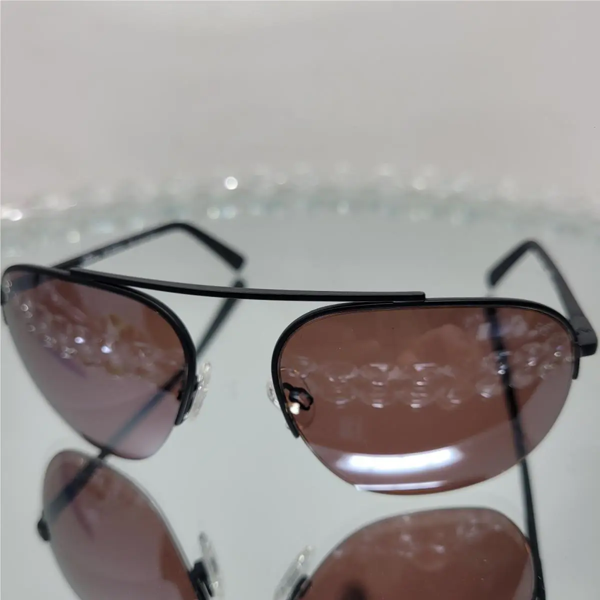 Revo Annika Sunglasses Satin Black Polarized Drive Champagne Lens 1201 01 GO