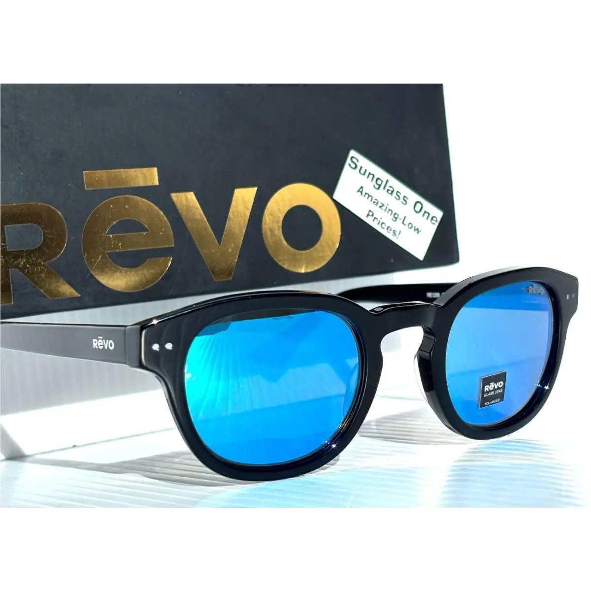 Revo Sterling Shiny Black Polarized Blue Lens Sunglass 1256 01 H2O
