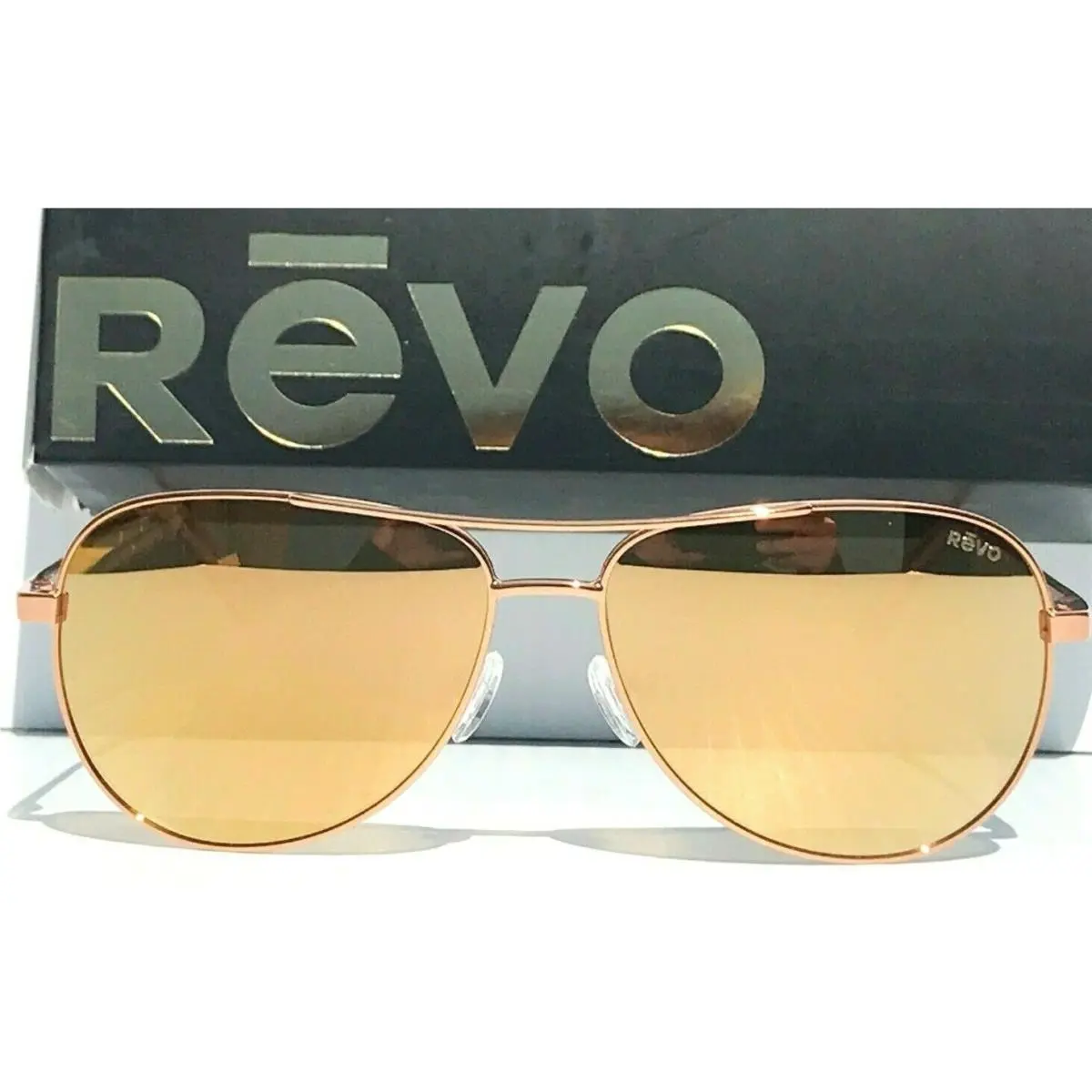 Revo Relay S Rose Gold w Polarized Champagne Lens Sunglass 1014 14 CH 59mm