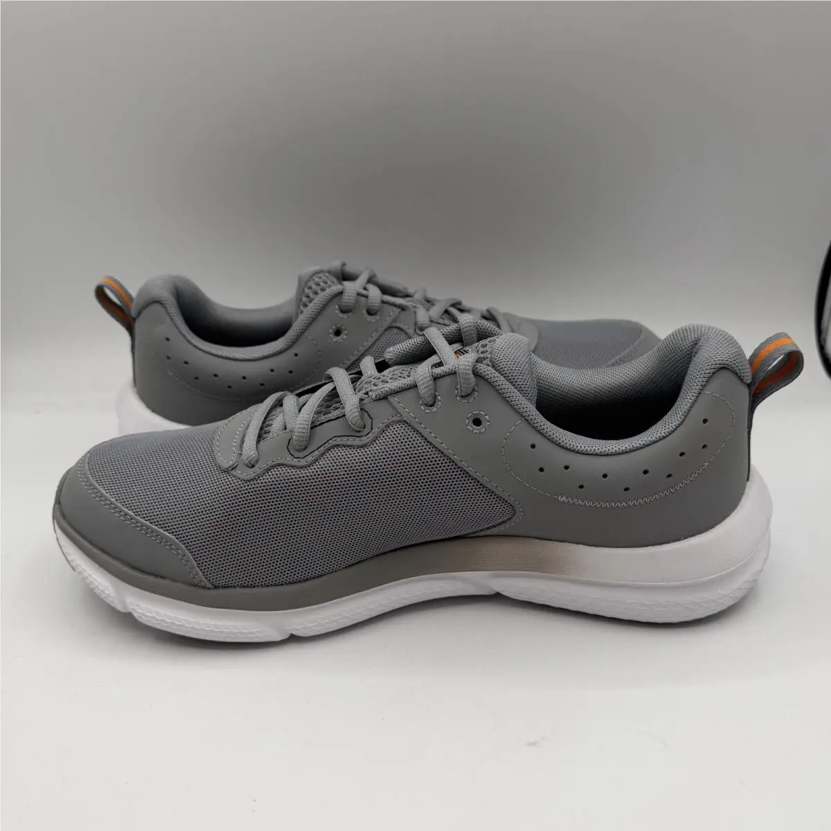 Under Armour shoes - Under Armour Charged Assert 10 - 3026175-105 - Gray 1