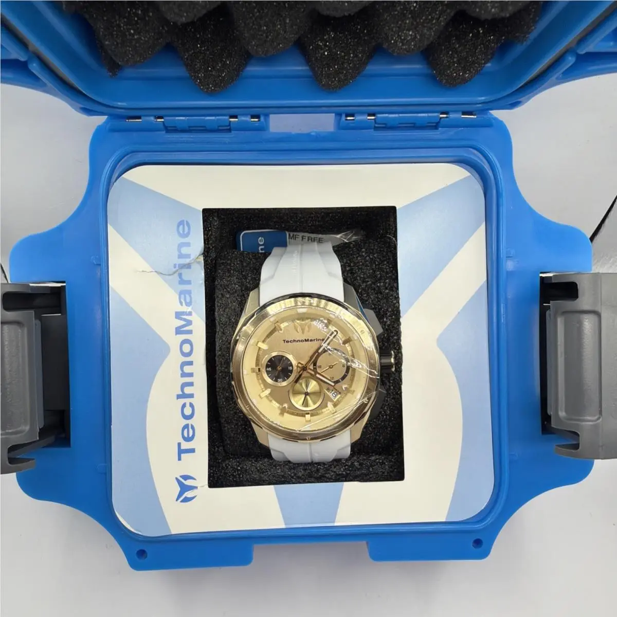 Technomarine Men`s Watch Ocean Nomad Black/gold Dial White Strap TM-318101 Case by TechnoMarine