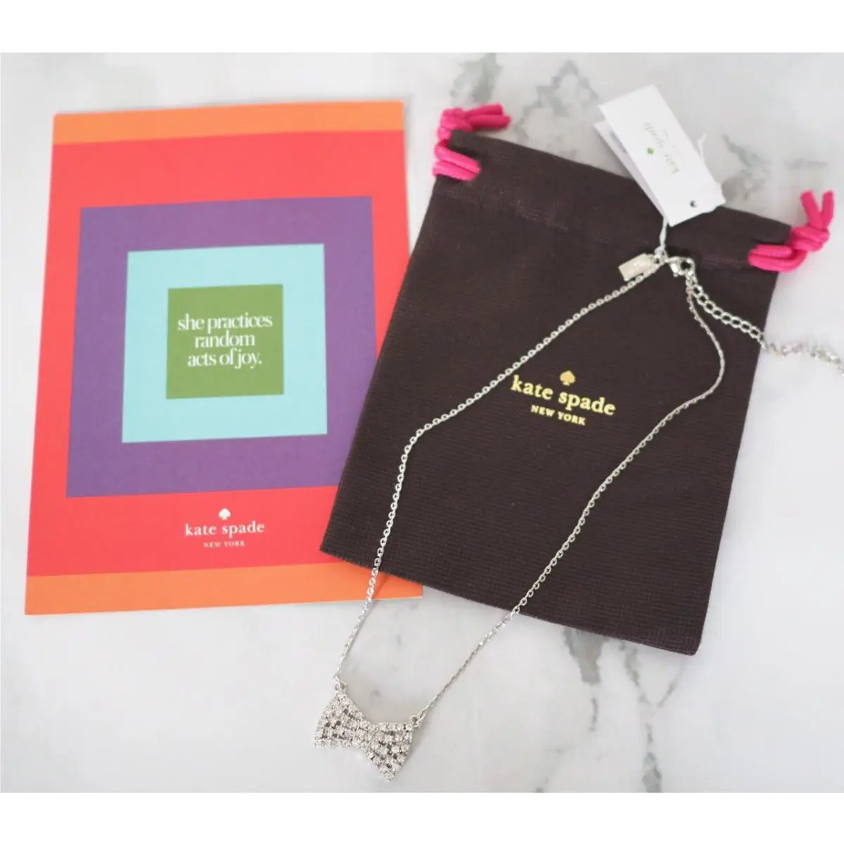 Kate Spade Sparkling Bow Mini Pendant Silver Jewelry Pouch